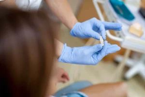 Dentist with Porcelain Crowns